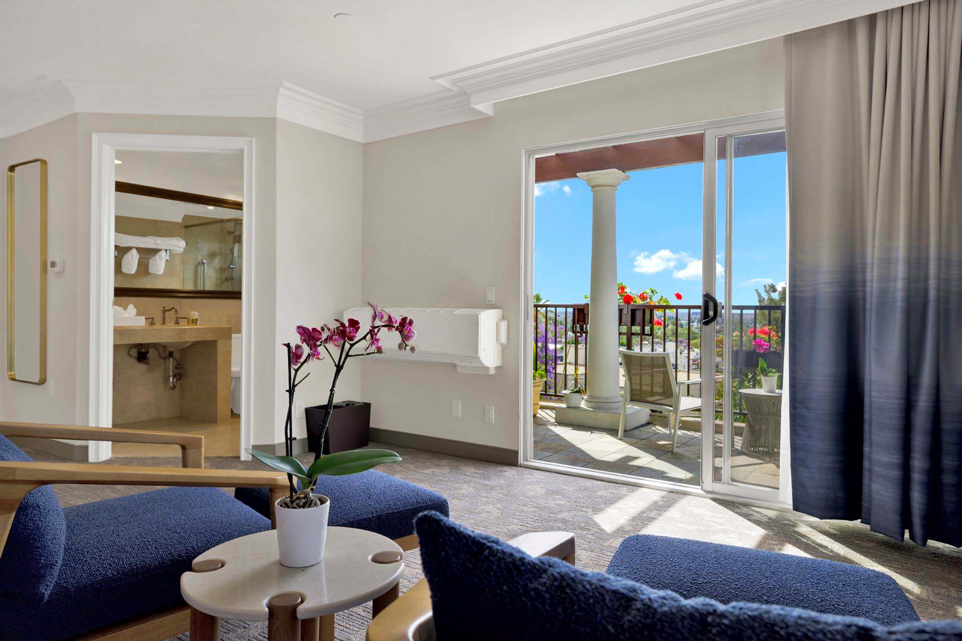 Seating area with large balcony doors