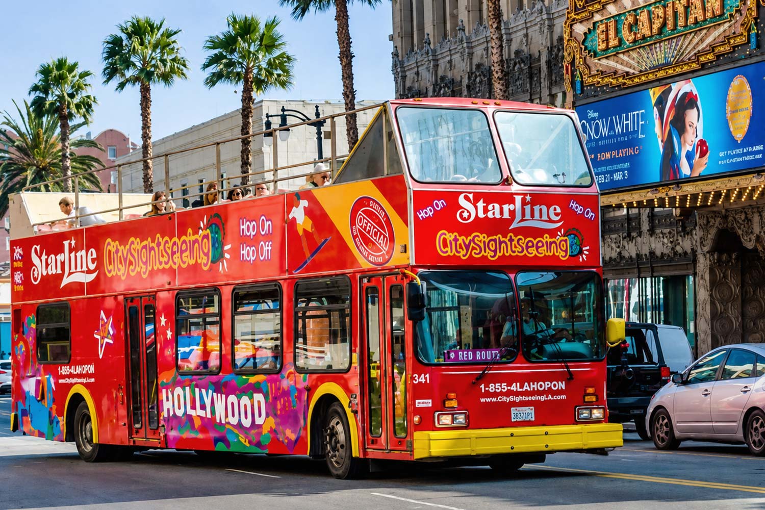 A red, double-decker, sightseeing tour bus